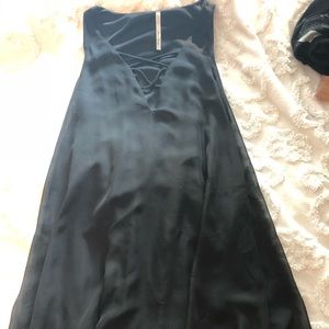 Black flowing dress with cross cross detail